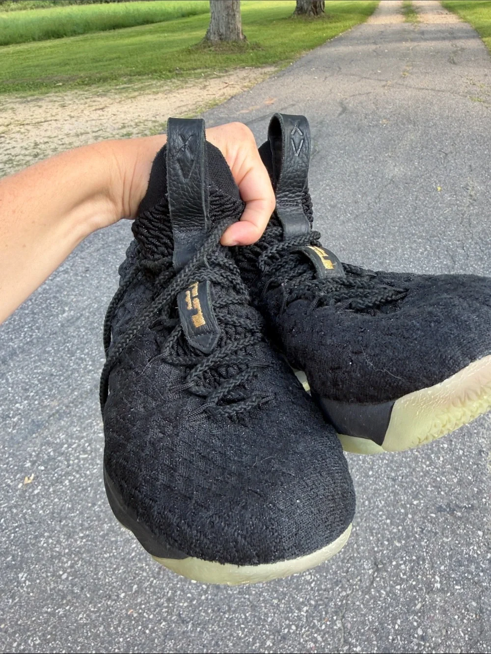 Nike Women's Black Knit Athletic Sneakers with Gold Accents
